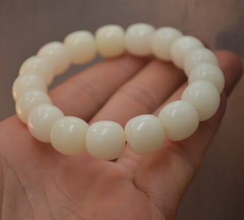 Unisex narukvica Bodhi korijena s plosnatim cilindričnim perlicama 13/12 mm