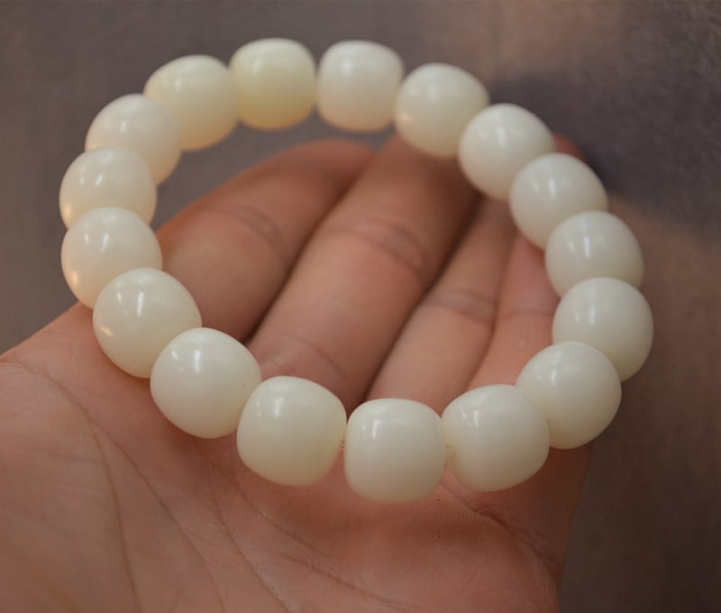 Unisex narukvica Bodhi korijena s plosnatim cilindričnim perlicama 13/12 mm