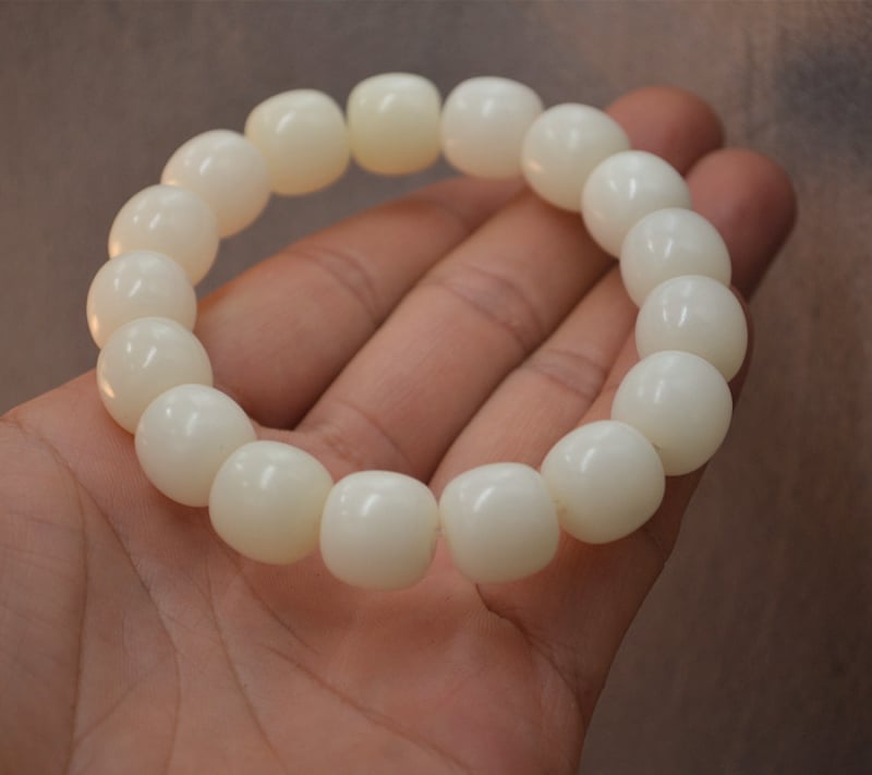 Unisex narukvica Bodhi korijena s plosnatim cilindričnim perlicama 13/12 mm