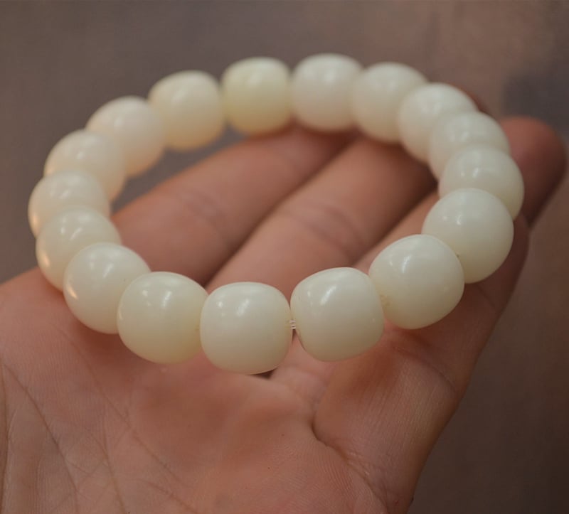 Unisex narukvica Bodhi korijena s plosnatim cilindričnim perlicama 13/12 mm