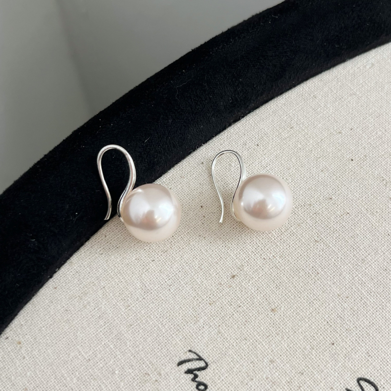 Perlové náušnice 2025 - ľahký luxus, elegantný geometrický dizajn pre ženy, jedinečný štýl