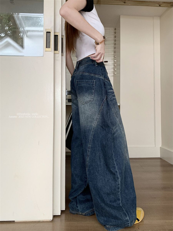 Ženske traperice visokim strukom i širokim nogama, distressed efekt, casual stil