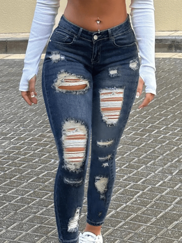 Ženske uske traperice s elastanom, srednji struk, poderotine, isprani denim