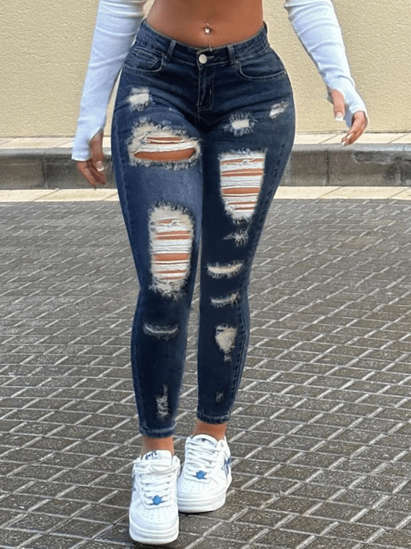 Ženske uske traperice s elastanom, srednji struk, poderotine, isprani denim