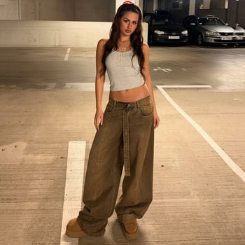 Široke traperice od denima s izblijedjelim efektom i jedinstvenim patchwork pojasom, opušten kroj, retro street stil za žene