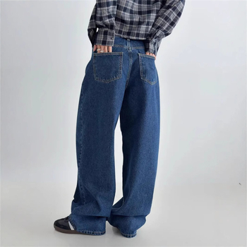 Ženske široke traper hlače od tamnoplave boje, retro casual stil, klasičan kroj, proljeće 2026