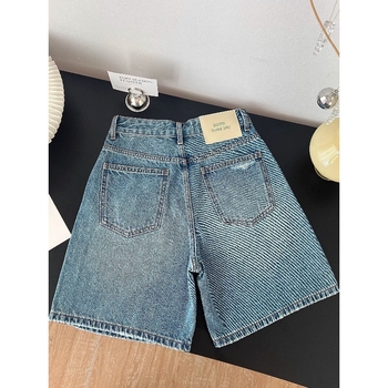 Modre ženske traperice s rupama u američkom retro stilu, ljeto 2026, visok pojas, široke nogavice, ravni kroj
