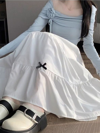 Francuski Hepburn stil s mašnicom, midi suknja s visokim pojasom, A-linija, napuhana, silueta kišobrana