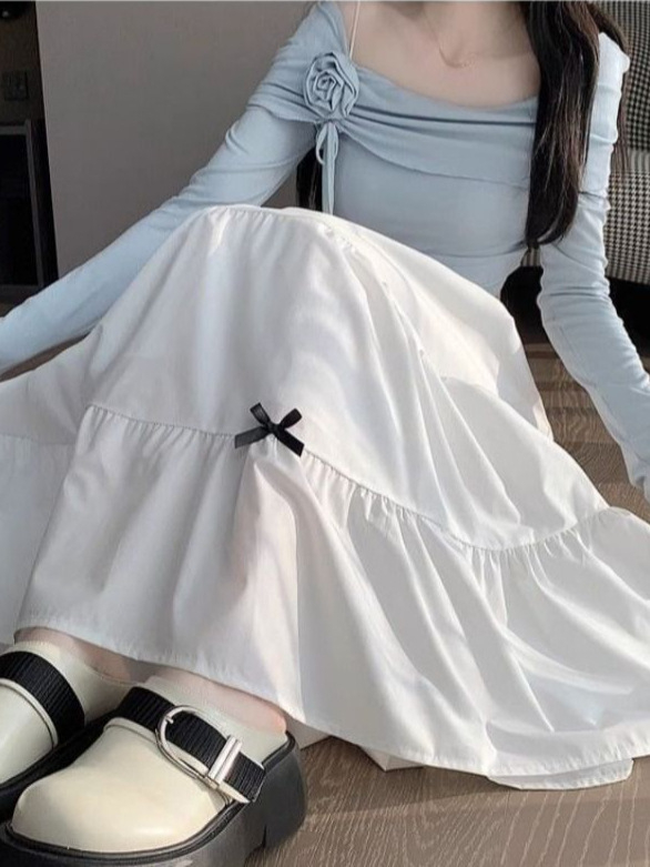 Francuski Hepburn stil s mašnicom, midi suknja s visokim pojasom, A-linija, napuhana, silueta kišobrana