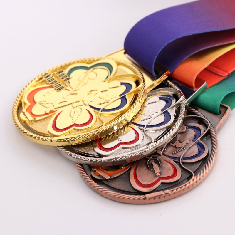 Metalne medalje za sportske događaje – spomen medalje za maraton, nogomet, košarku i školske sportske manifestacije