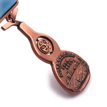 Medalje od cinkovog legura, u obliku tikve, za sportska događanja i maratone.