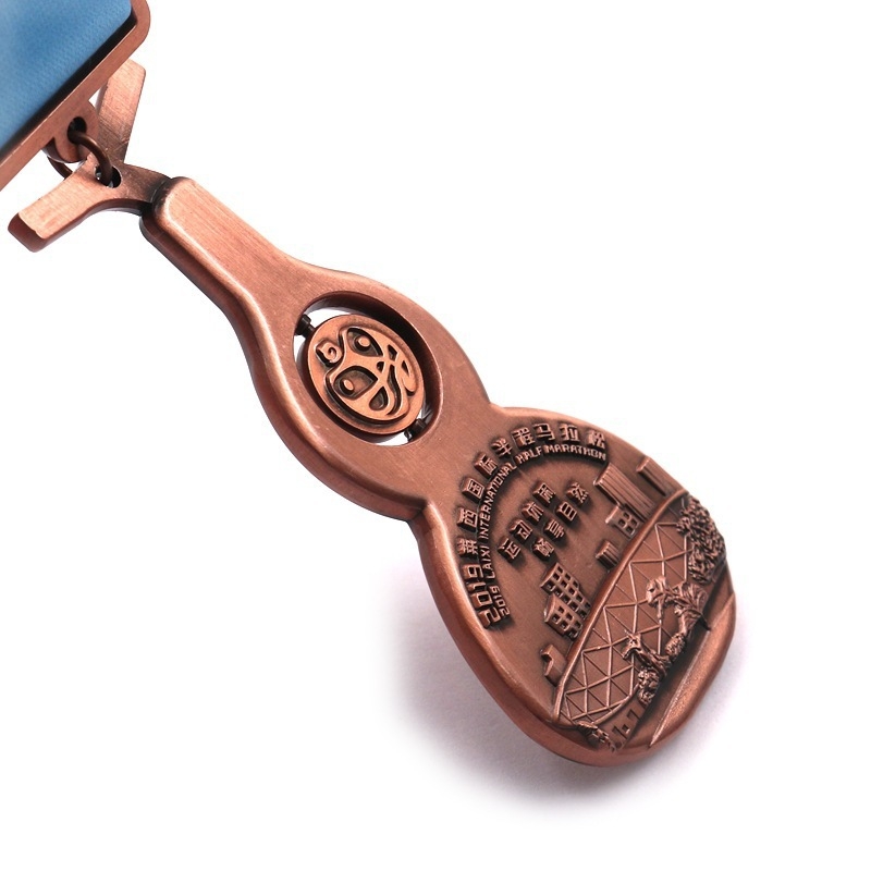 Medalje od cinkovog legura, u obliku tikve, za sportska događanja i maratone.