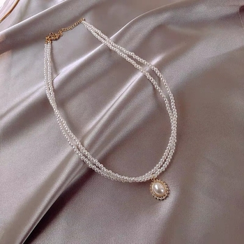 Ogrlica s perlom i lancem za ključnicu za žene – minimalistička, elegantna