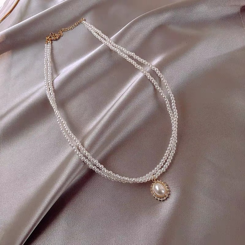 Ogrlica s perlom i lancem za ključnicu za žene – minimalistička, elegantna
