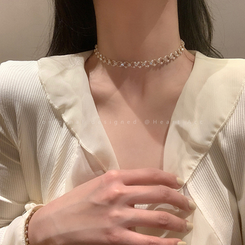 Biserni choker ogrlica s lančićem za ključnu kost, ženski nakit, nišni dizajn, lagani luksuz