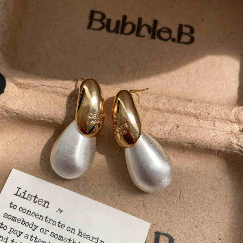 Ženske kapkovite naušnice od metala s dvobojnom završnicom, minimalistički dizajn, elegantan brušeni završetak