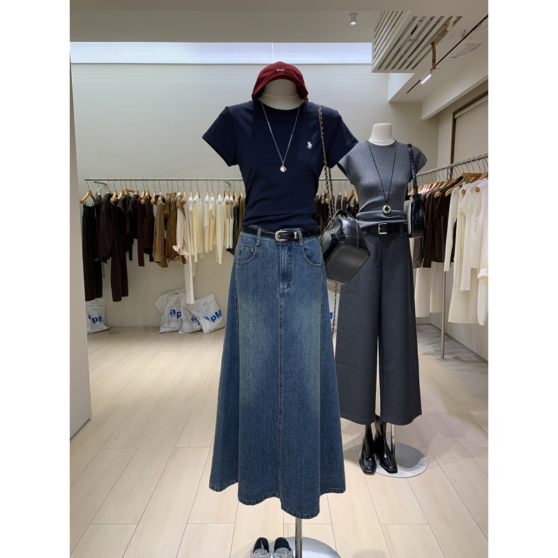 Duga A-linijska suknja od pamuka denim, visokim pojasom, retro pranjem