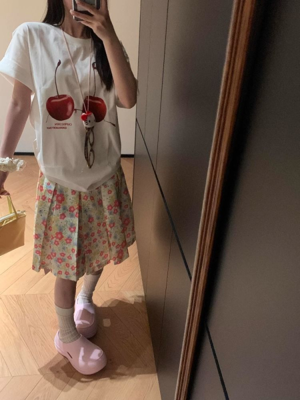 Francuski stil plisirana midi suknja s cvjetnim uzorkom, A-linija, ljeto 2025