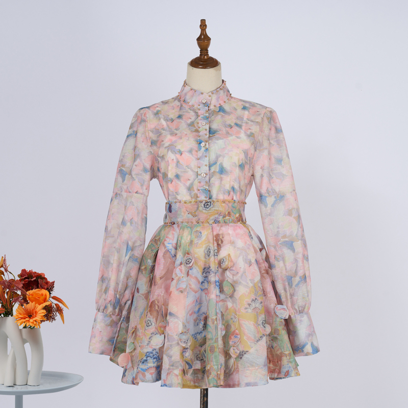 Set bluza u francuskom stilu s visokim ovratnikom i floralnim printom, dugih rukava i suknja s visokim strukom
