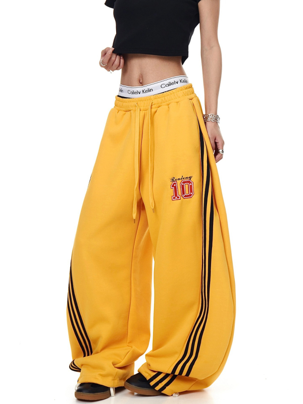 Ženske široke hlače s prugama i izvezenim slovima, gradski stil, opušten kroj