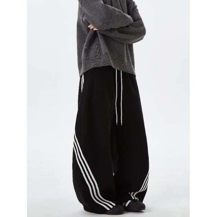 Američki gradski stil: široke sportske hlače s prugama i blokovima boja, unisex, retro dizajn, s vrpcom u struku i opuštenim krojem