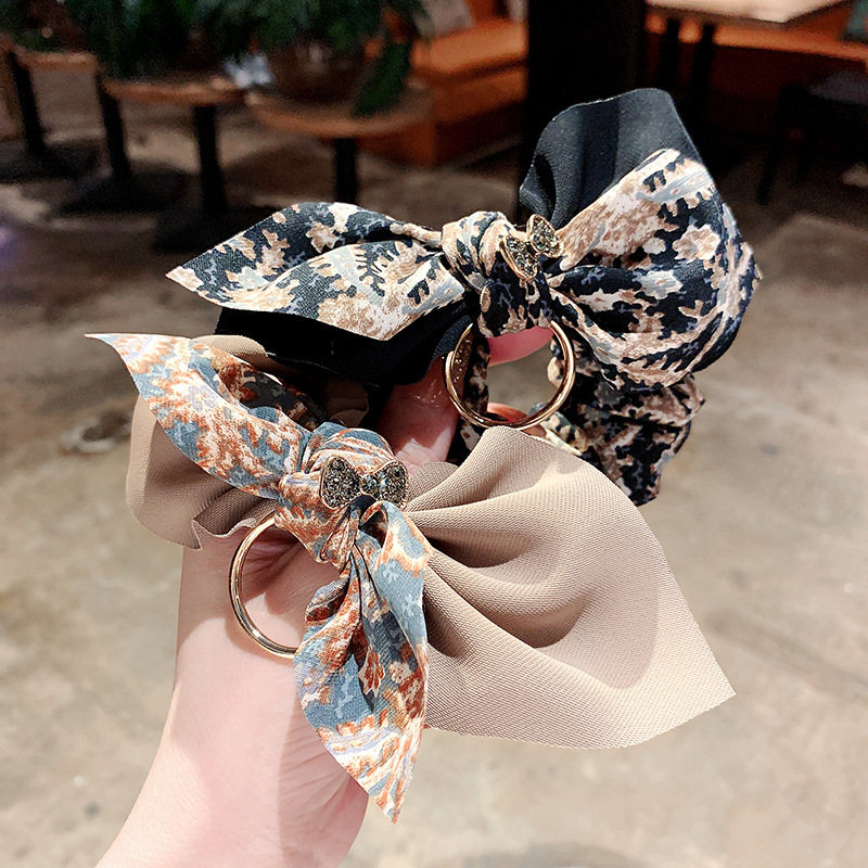 Korejski stil cvjetna mašna za kosu – elegantna tkaninska gumica za bun ili rep