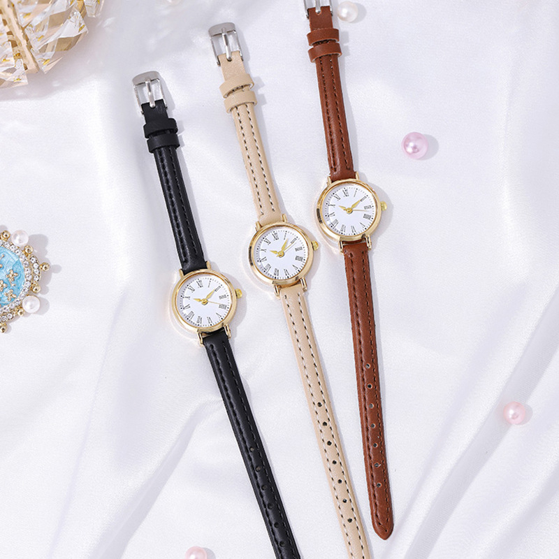Ženski kvarcni sat s uskim PU remenom, retro stil, okrugli brojčanik s rimskim brojevima; kućište od cinkove legure, promjer brojčanika 23 mm, debljina 7 mm.