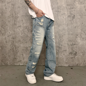 Muške traperice u streetwear stilu, vintage isprane, istrošene, ravni kroj
