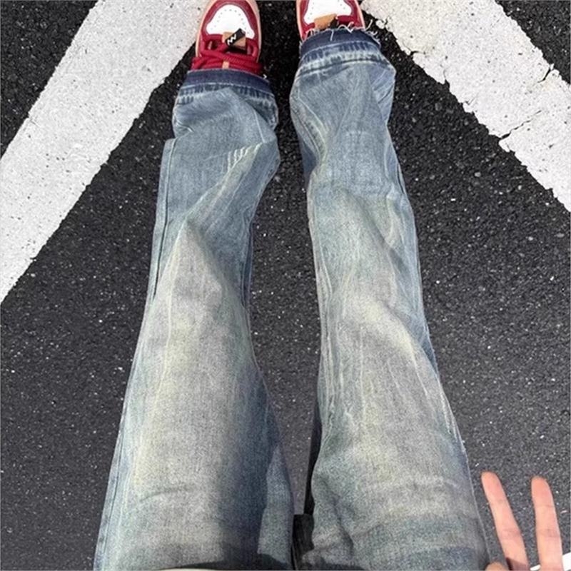 Muške traperice u vintage plavoj boji s uzorkom munje i otiscima mačjih šapa, američki street style, ravni kroj s blagim širenjem krajeva