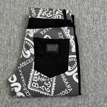 DG Dujia 24SS Muške traperice s printom, slim/straight kroj, patchwork detalji
