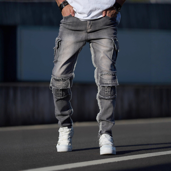 Teške retro radničke traperice s višestrukim džepovima, opušten kroj ravnih nogavica, plave denim hlače za muškarce