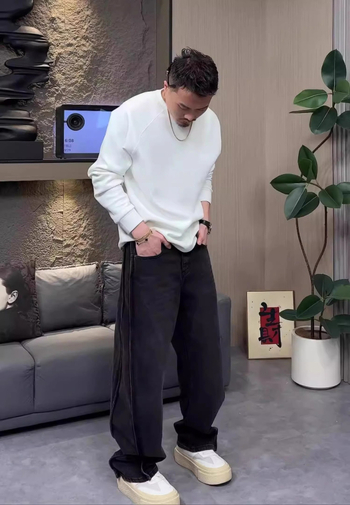 Muške crne široke traperice s drapiranjem, jesenski stil, duljina do poda