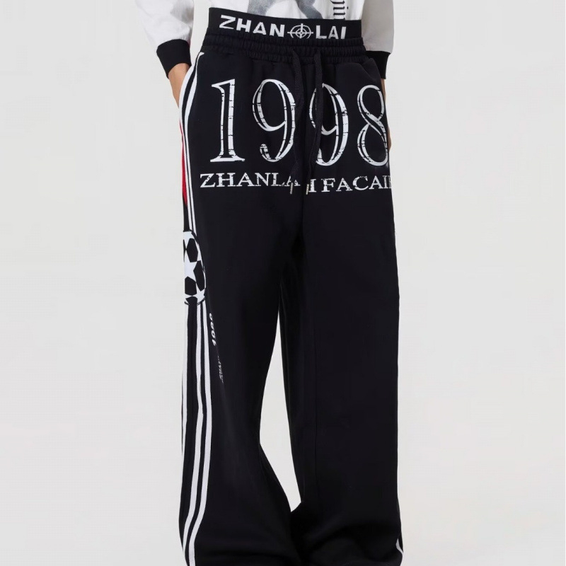 Muške jesenske hlače širokog kroja s flis podlogom, opušten casual stil, duge sportske hlače, elastične.