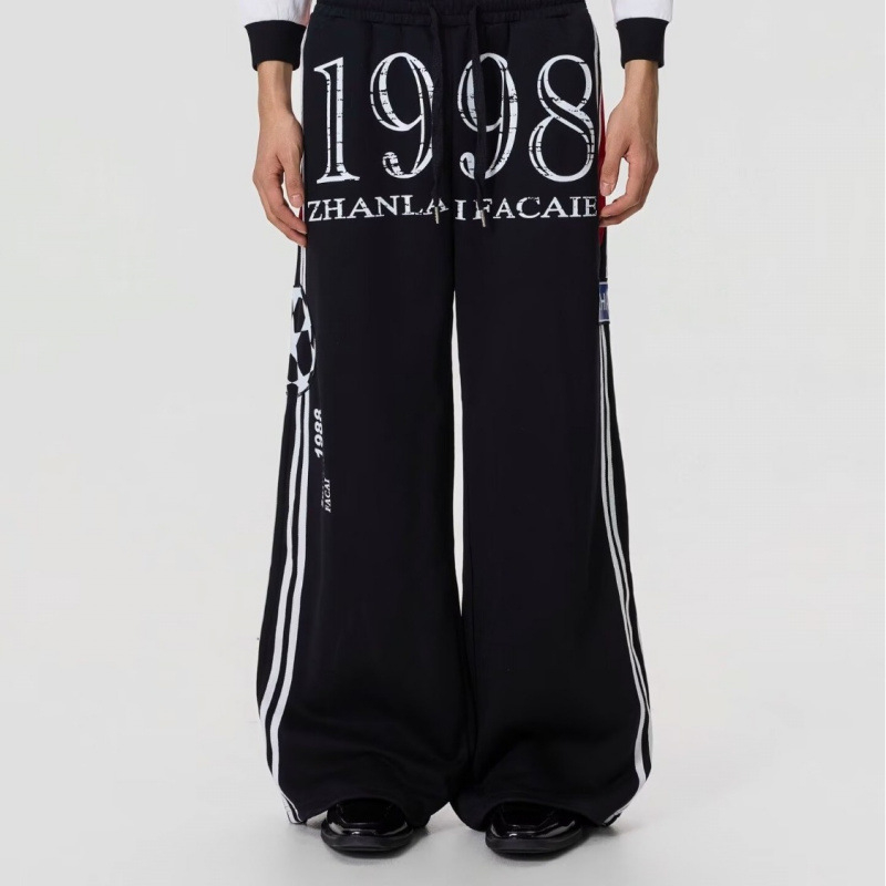 Muške jesenske hlače širokog kroja s flis podlogom, opušten casual stil, duge sportske hlače, elastične.