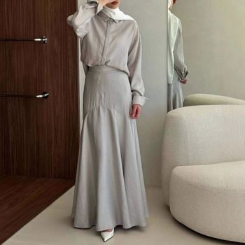 Ženski dvodijelni set: suknja i košulja s dugim rukavima, opušteni gornji dio i uska suknja, elegantan stil, moda 2026