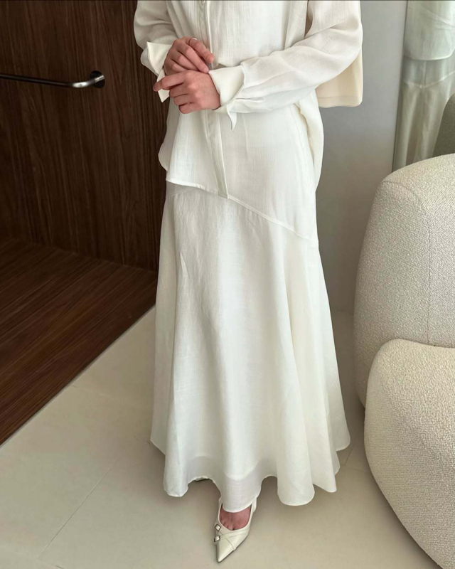 Ženski dvodijelni set: suknja i košulja s dugim rukavima, opušteni gornji dio i uska suknja, elegantan stil, moda 2026