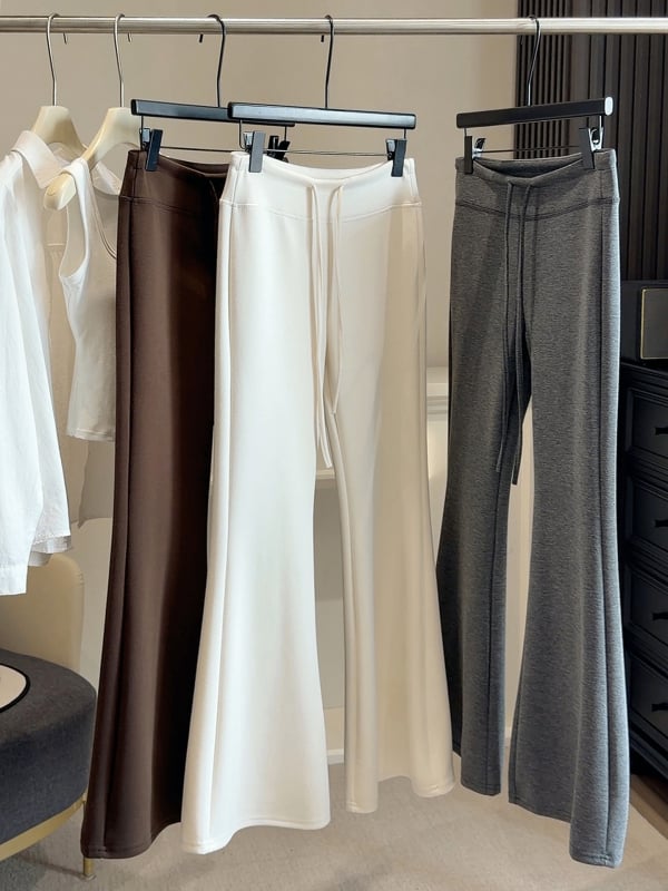Damske pamukne hlače s flared krojem, visoki struk, vezanje, ležerni sportski stil, sive