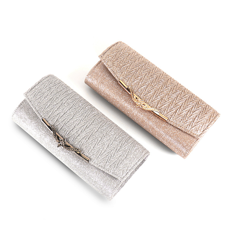 Ženska večernja clutch torbica s metalnim kutijem, ručna izrada, sjajna površina, dekorativne metalne trake