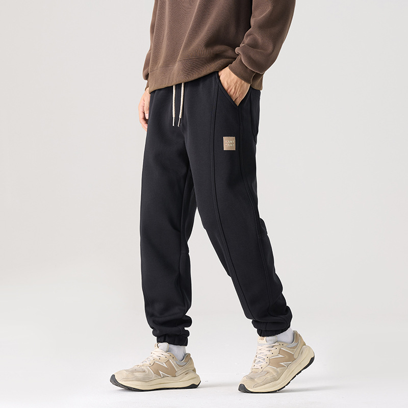 Muške hlače za trening američkog stila, teške, s vezicom u struku, jogger stil za sportsko i ležerno nošenje u jesen.