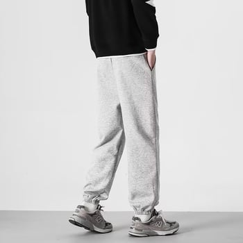 Muške casual hlače, crne, širokih nogavica, s vezicom, sportski stil, duljina 9/10