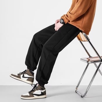Muške casual hlače, crne, širokih nogavica, s vezicom, sportski stil, duljina 9/10