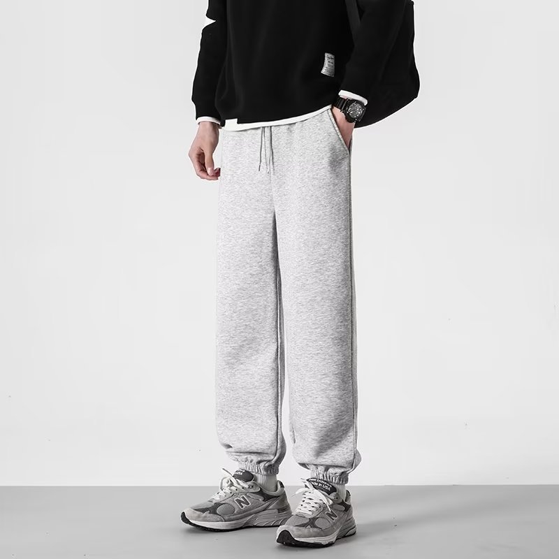 Muške casual hlače, crne, širokih nogavica, s vezicom, sportski stil, duljina 9/10