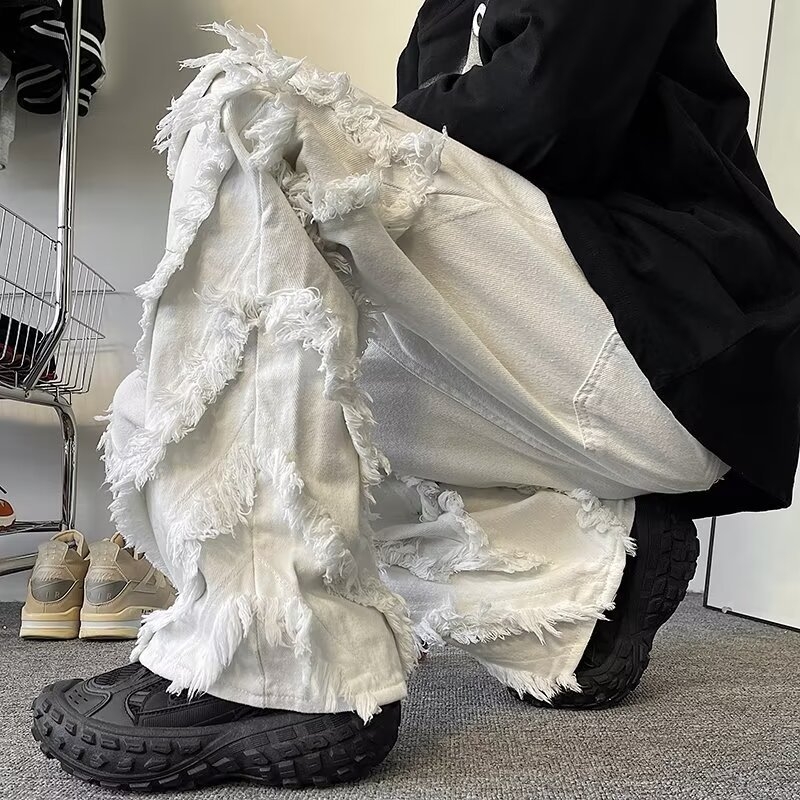 Muške traperice s frayed rubom, denim, jesen-zimska moda, straight kroj, street hip-hop stil