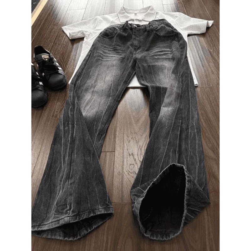 Muške traperice Cleanfit u američkom street stilu, isprani denim s oštećenjima, crno-sive, ravnog kroja s blagim širim donjim dijelom