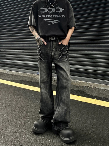 Traperice američkog retro stila s uzorkom pukotina poput munje, crna isprana, distressed, ležernog ravnog kroja, unisex