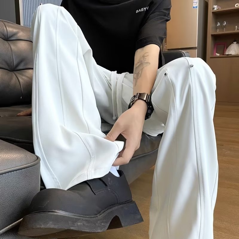 Férfiaknak szóló ice silk egyszínű nadrág, laza szabású, enyhe flare, mindennapi viselet