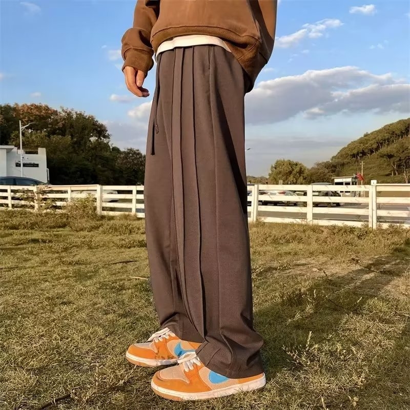 Barna oversized nadrág lazán szabott egyenes vonalú, drapált és széles szárú, őszi casual viselet, poliészter-keverék