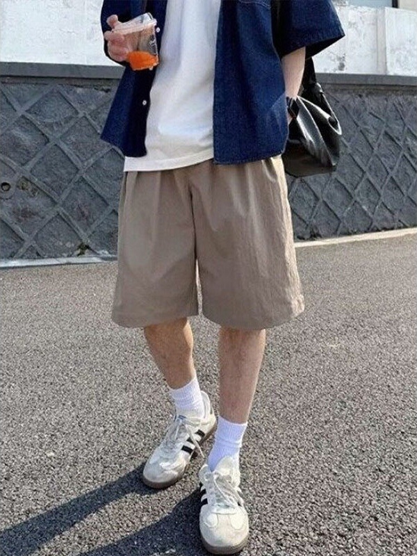 Khaki színű cargo férfi capri nadrág, széles szabás, övvel, nyári sportos stílus