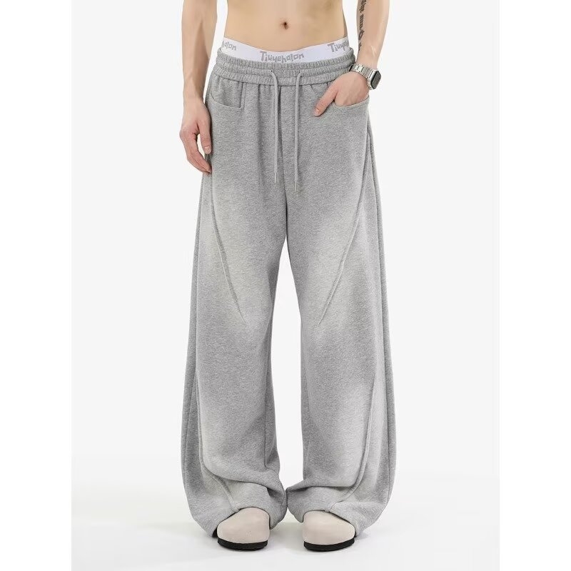 Férfi fleece-béléssel bélelt széles lábú, laza sportnadrág, magas derekú, egyenes szabású, kötőzáras, egyszínű, mind a négy évszakra