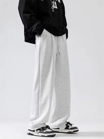 Férfi fleece-béléssel ellátott nehéz szürke sportnadrág, lazán szabott egyenes szabás, mindennapi kényelem